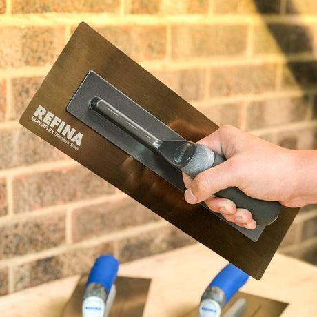 holding a suerflex 3 plastering trowel