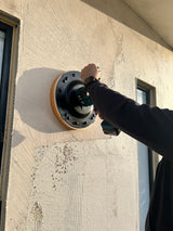 Skimflex cordless power float flattening render base coat on exterior wall